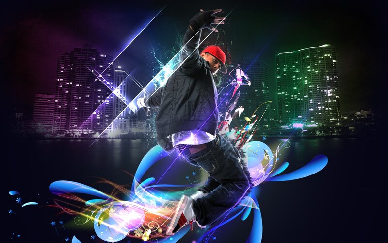 Breakdancer in city at night