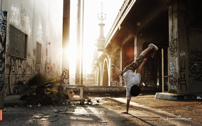 Breakdancer in urban alley