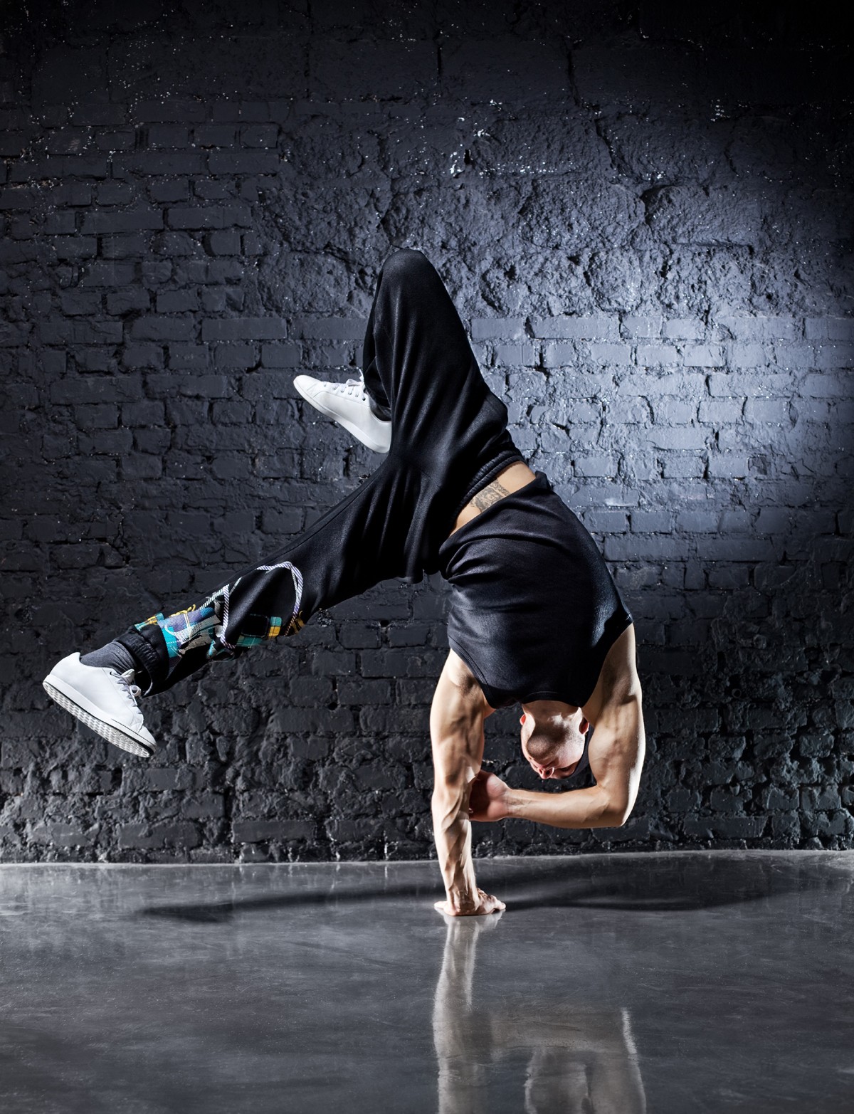 Breakdancer performing handstand