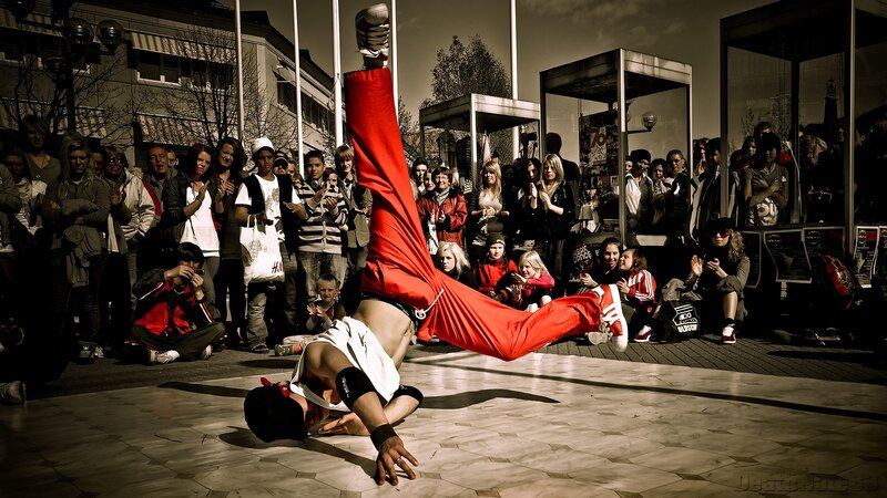 Breakdancer Performing Move — Red