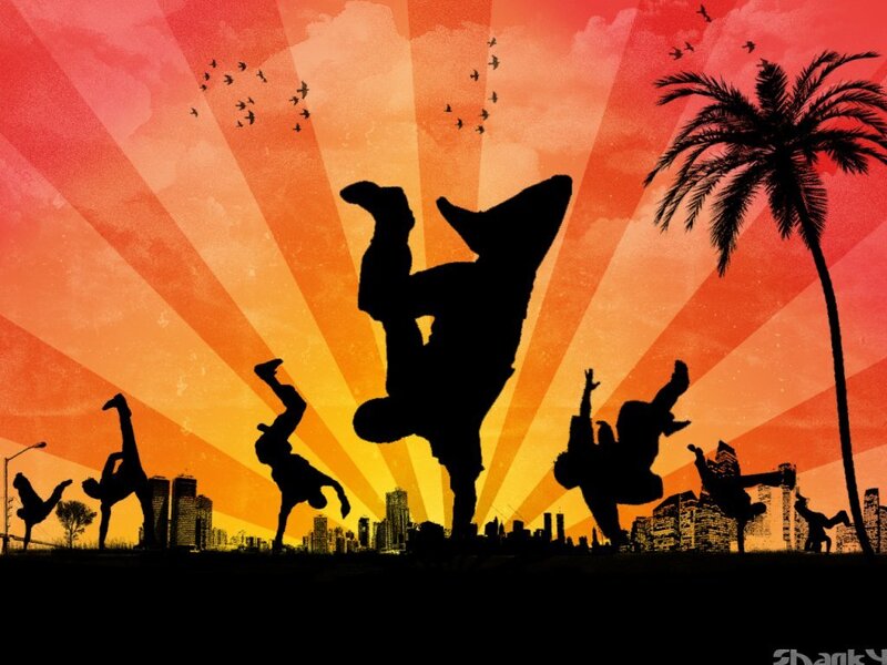 Breakdancing silhouettes at sunset