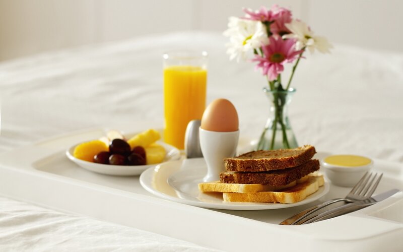 Breakfast in bed with flowers