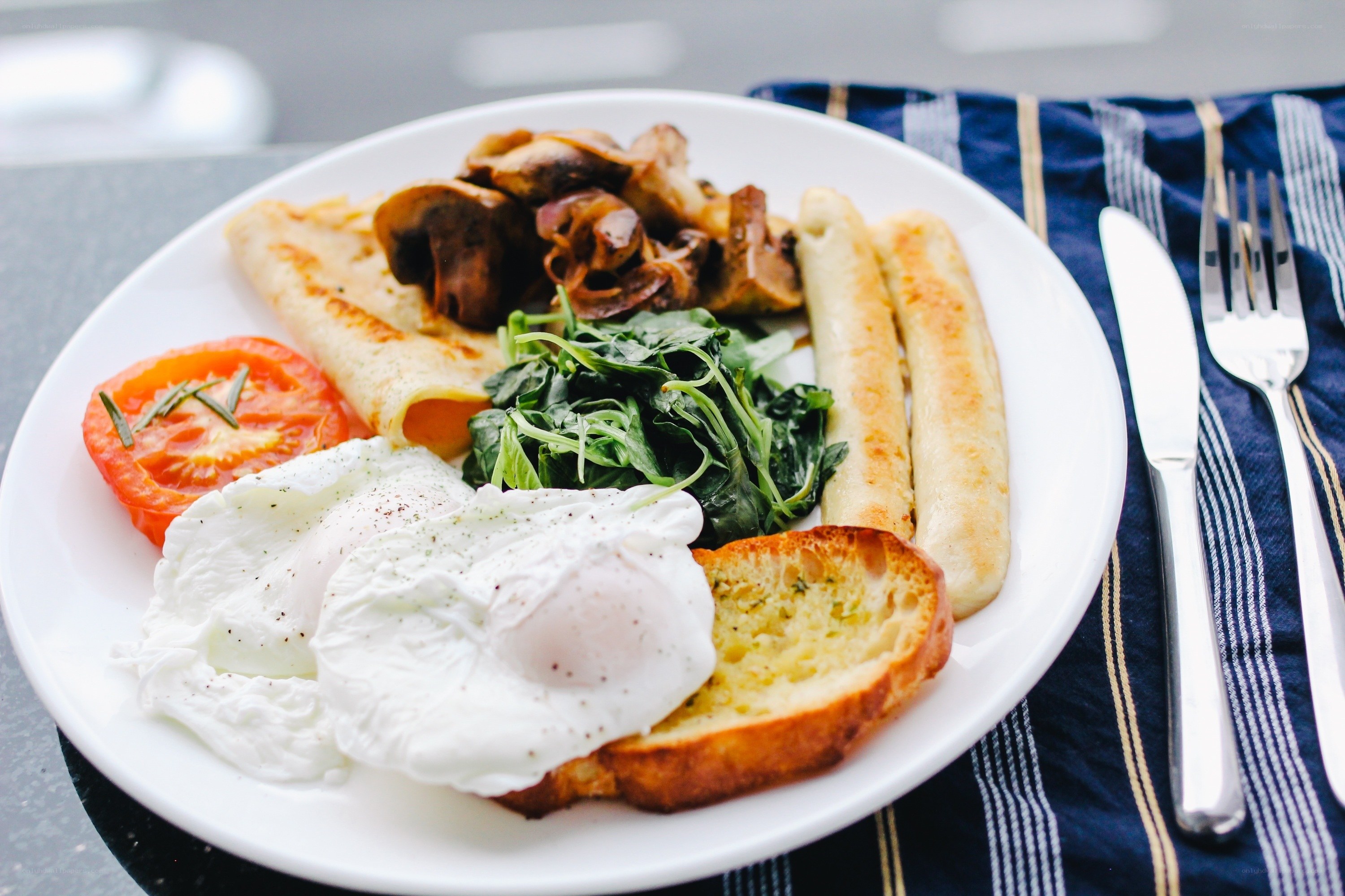 Breakfast plate with eggs and sausages