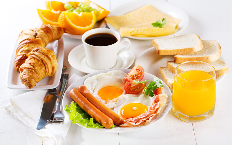 Breakfast Spread on Table — White, Appetizing, Morning