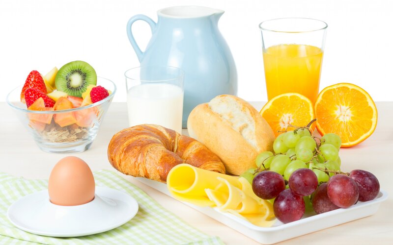 Breakfast Spread on Table — White, Calm, Morning, Photograph, Fruit Bowl, Croissant