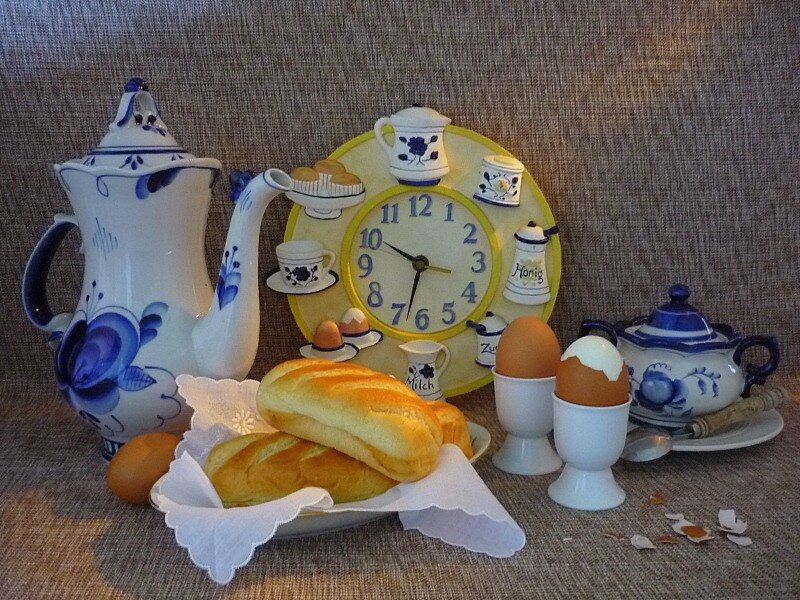 Breakfast still life with clock
