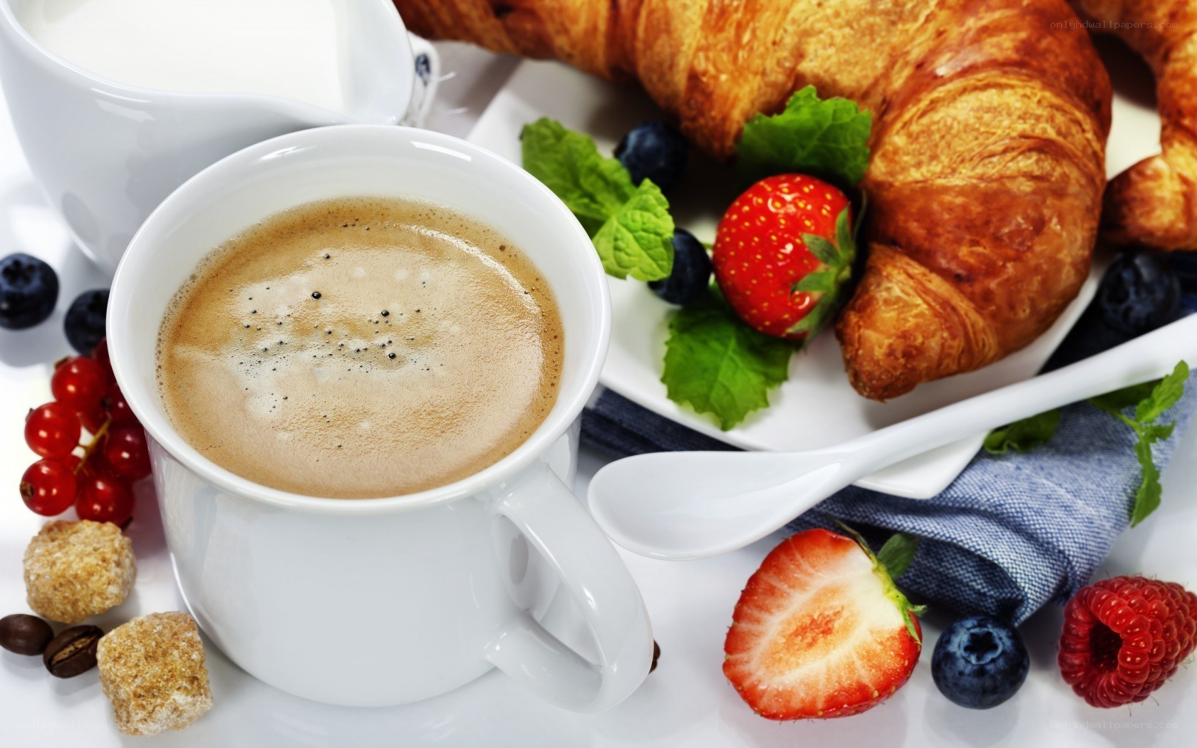 Breakfast with coffee and croissant