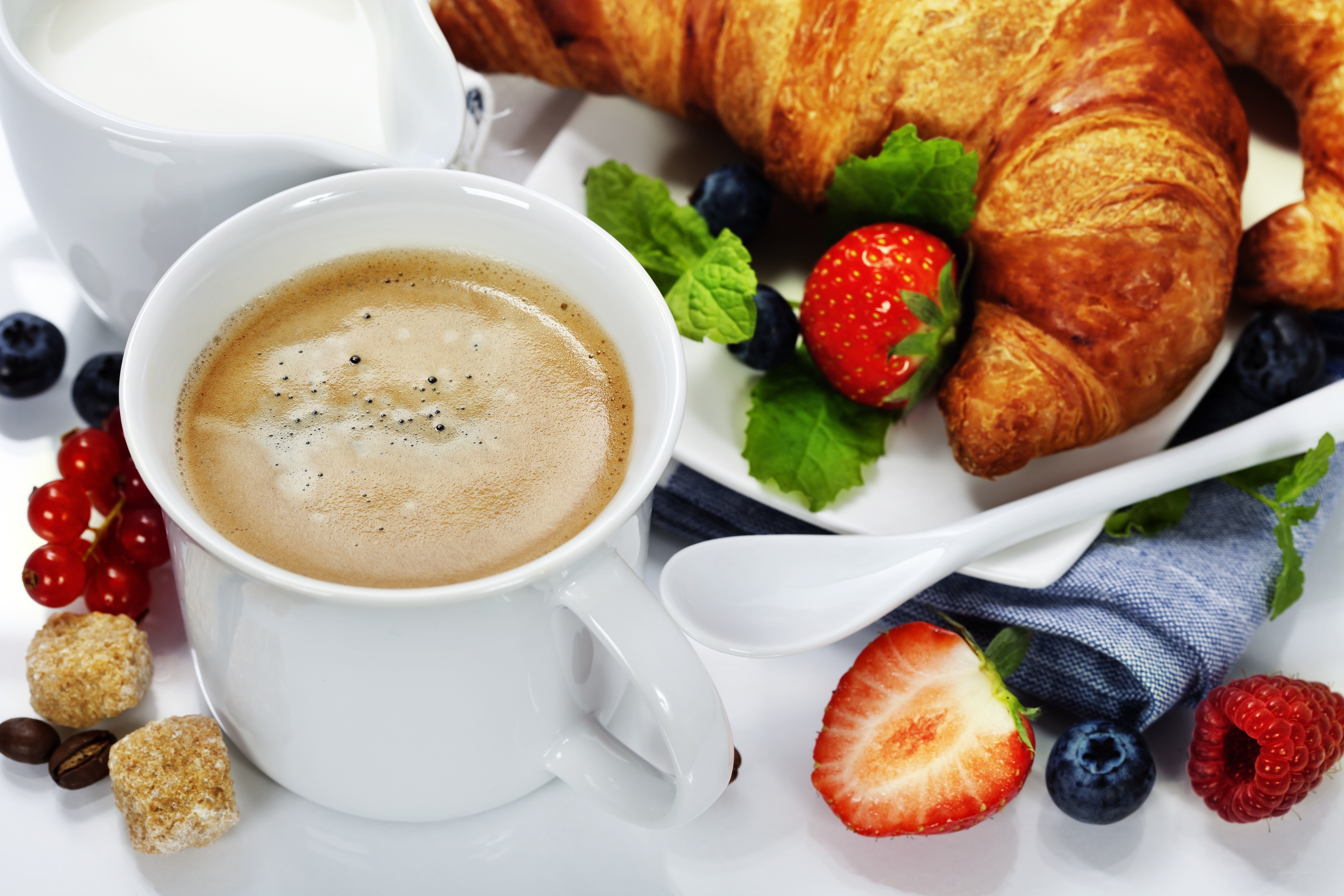 Breakfast with coffee and croissant