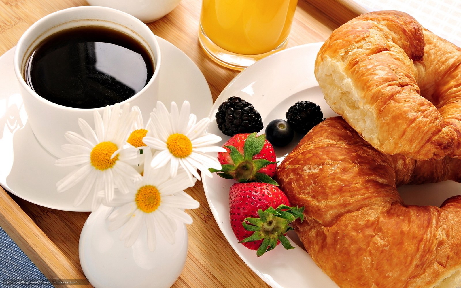 Breakfast with coffee and croissants