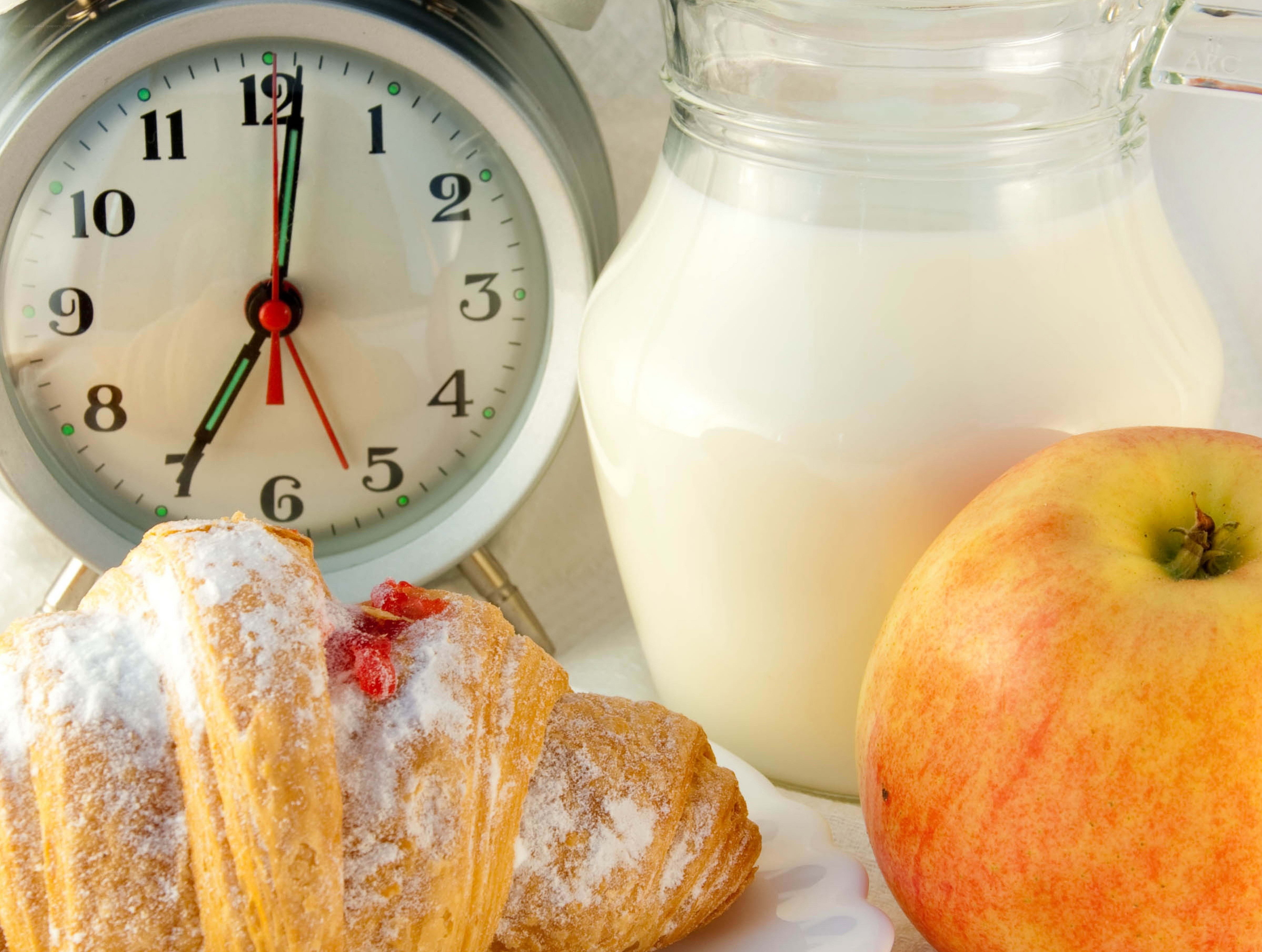 Breakfast with croissant and milk