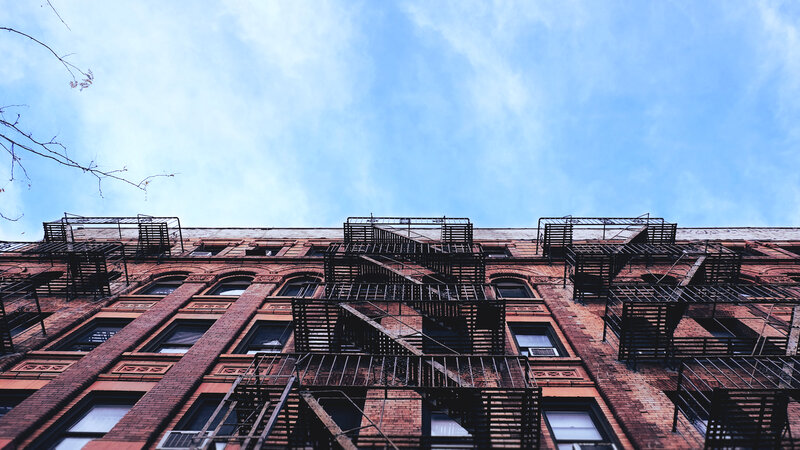 Brick Apartment Building — Red