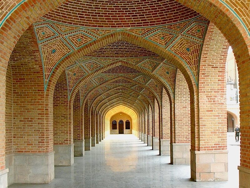 Brick archway corridor