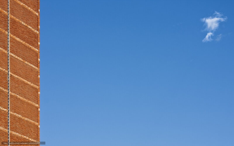 Brick building against blue sky