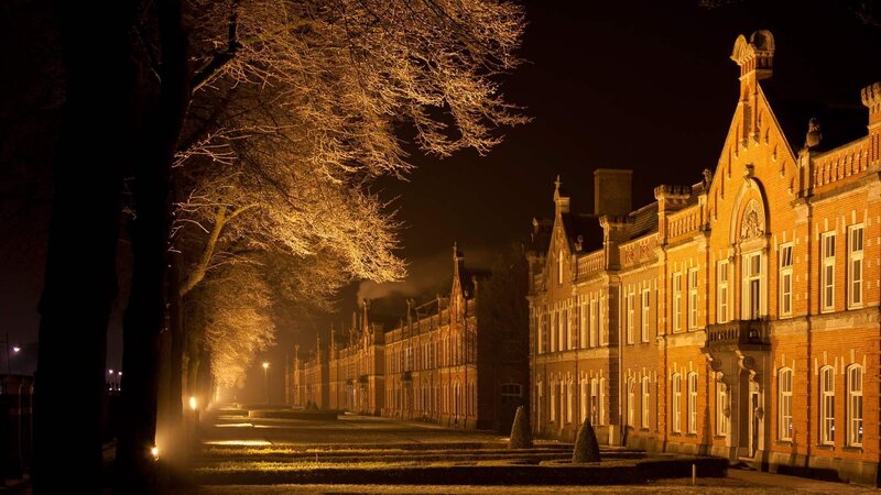 Brick Building at Night — Orange