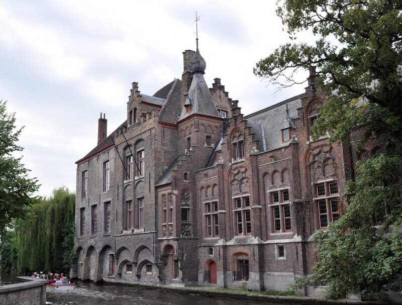Brick Building by Canal — Brown