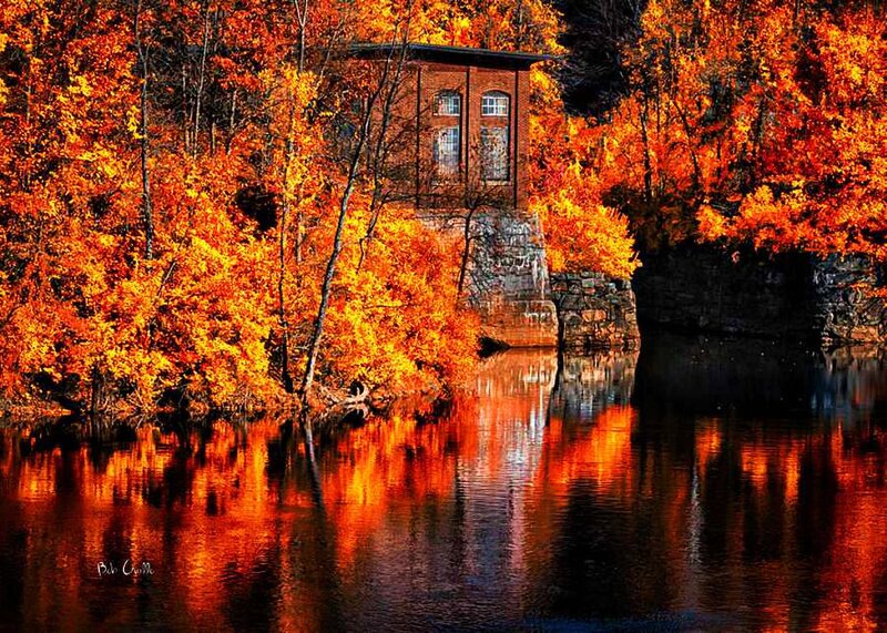 Brick Building by River — Orange