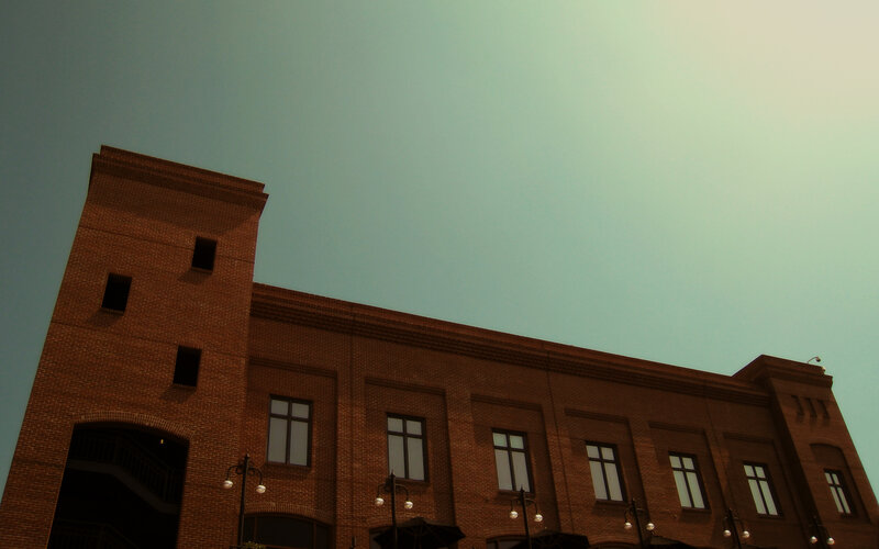 Brick Building Facade — Brown, Dramatic, Sunset