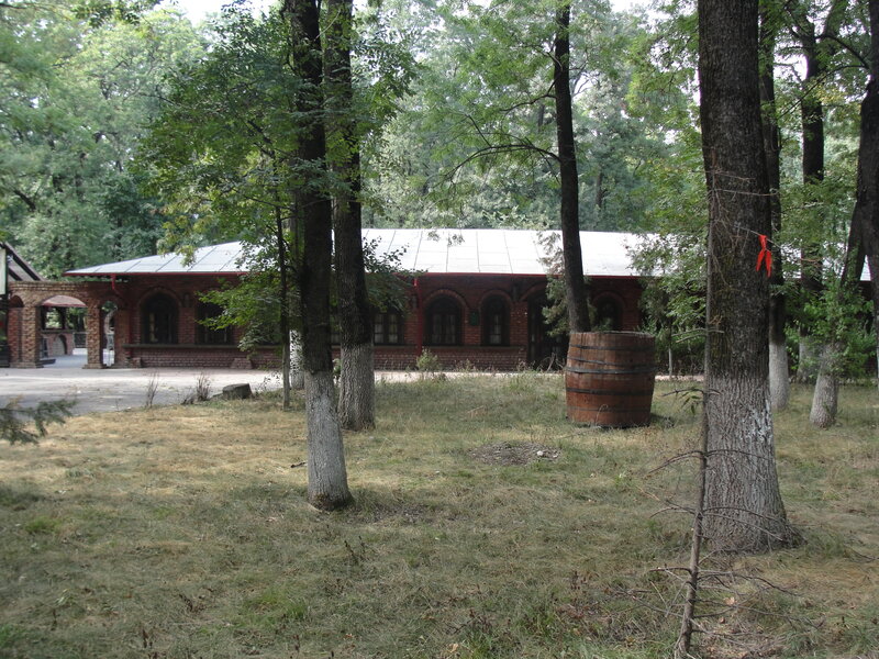 Brick building in wooded area
