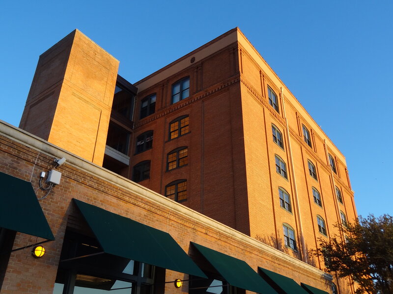 Brick Building with Awnings — Brown