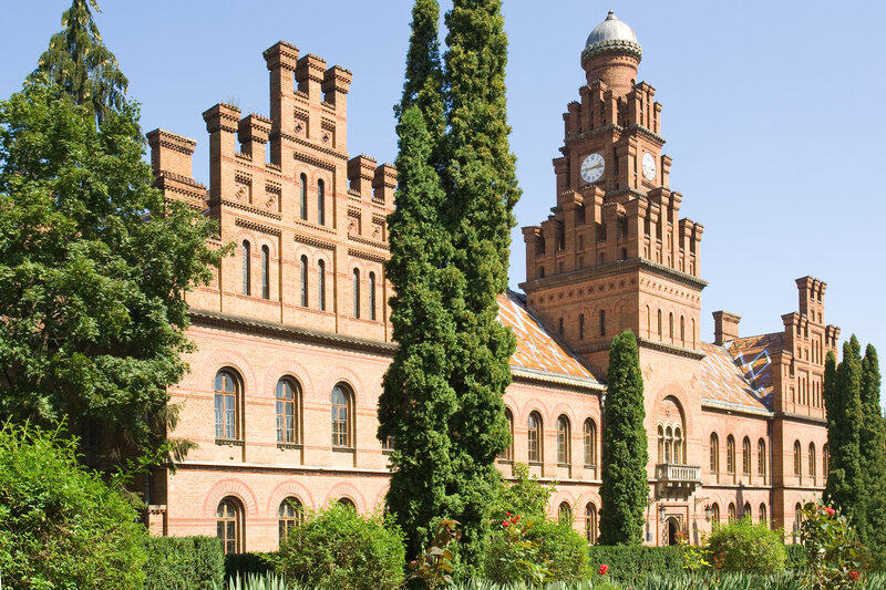 Brick Building with Clock Tower — Red