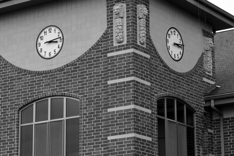 Brick Building with Clocks