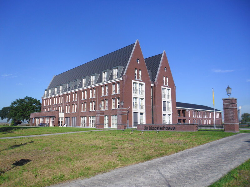 Brick Building with Gabled Roof — Blue