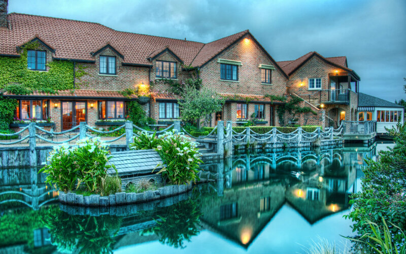 Brick Building with Pond — Blue