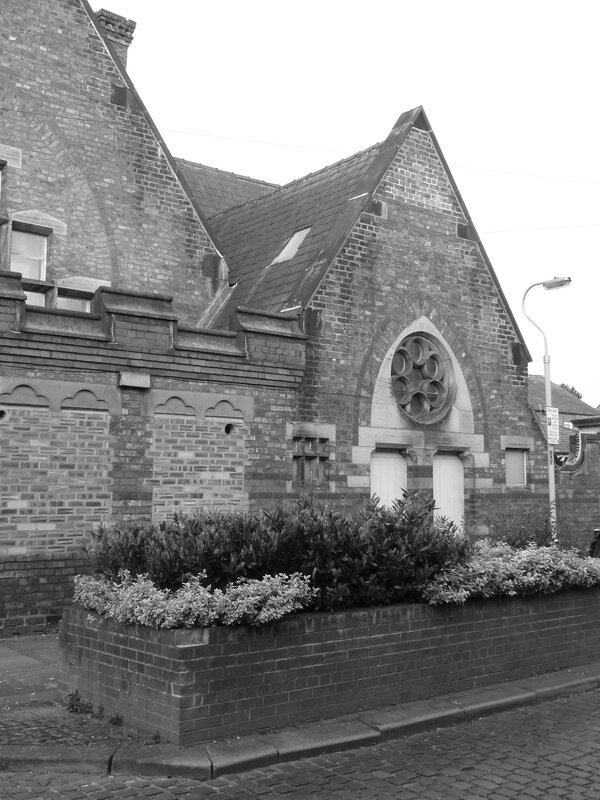 Brick Building with Rose Window — Black, Calm