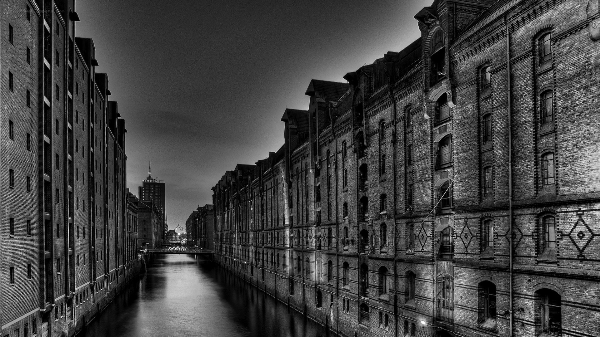 Brick buildings along a canal