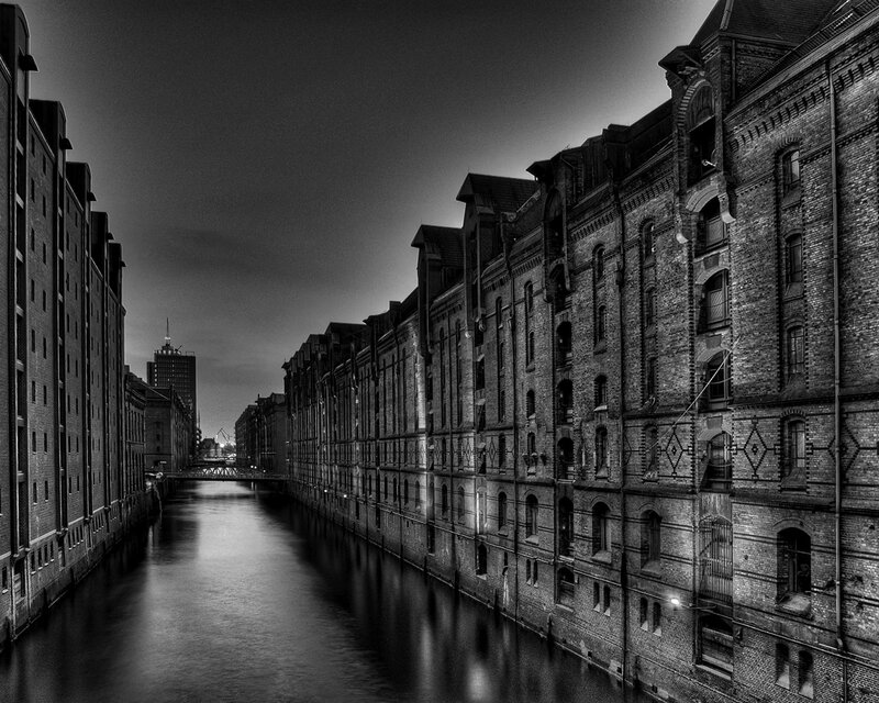 Brick Buildings Along Canal — Black, Dramatic, Night, Photograph, Sky