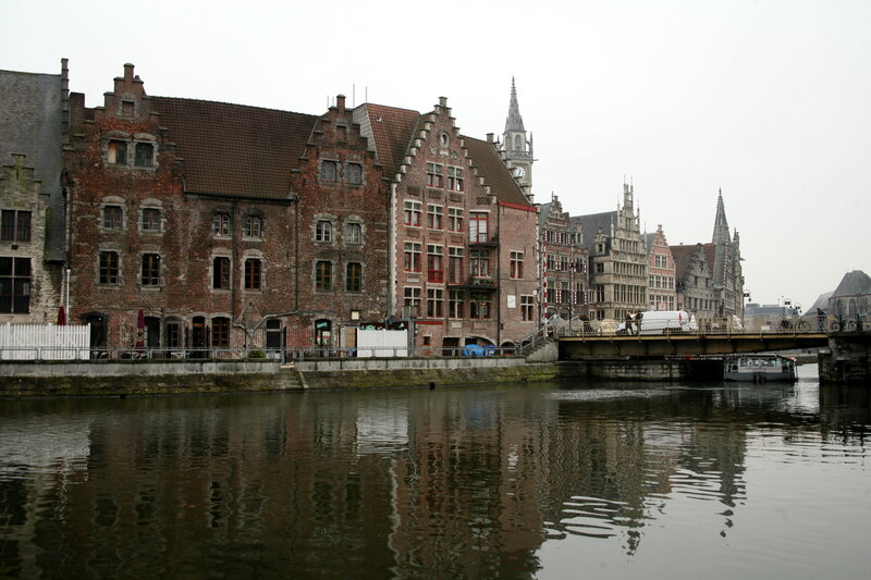 Brick Buildings Along Canal — Brown