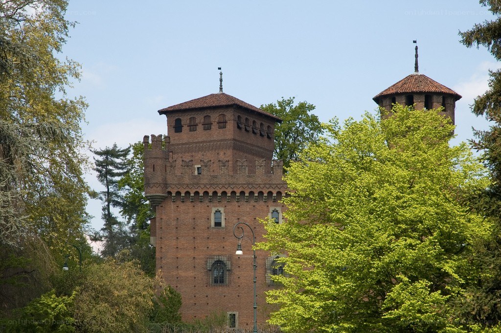 Brick castle towers in park