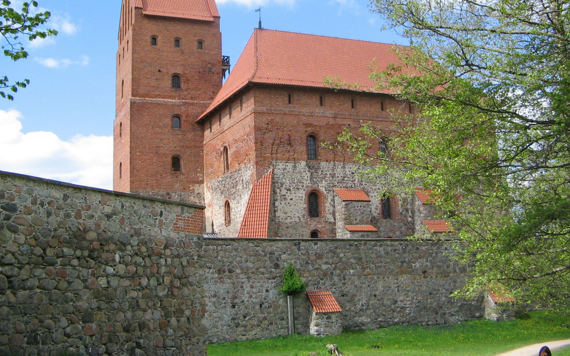 brick castle with red roof