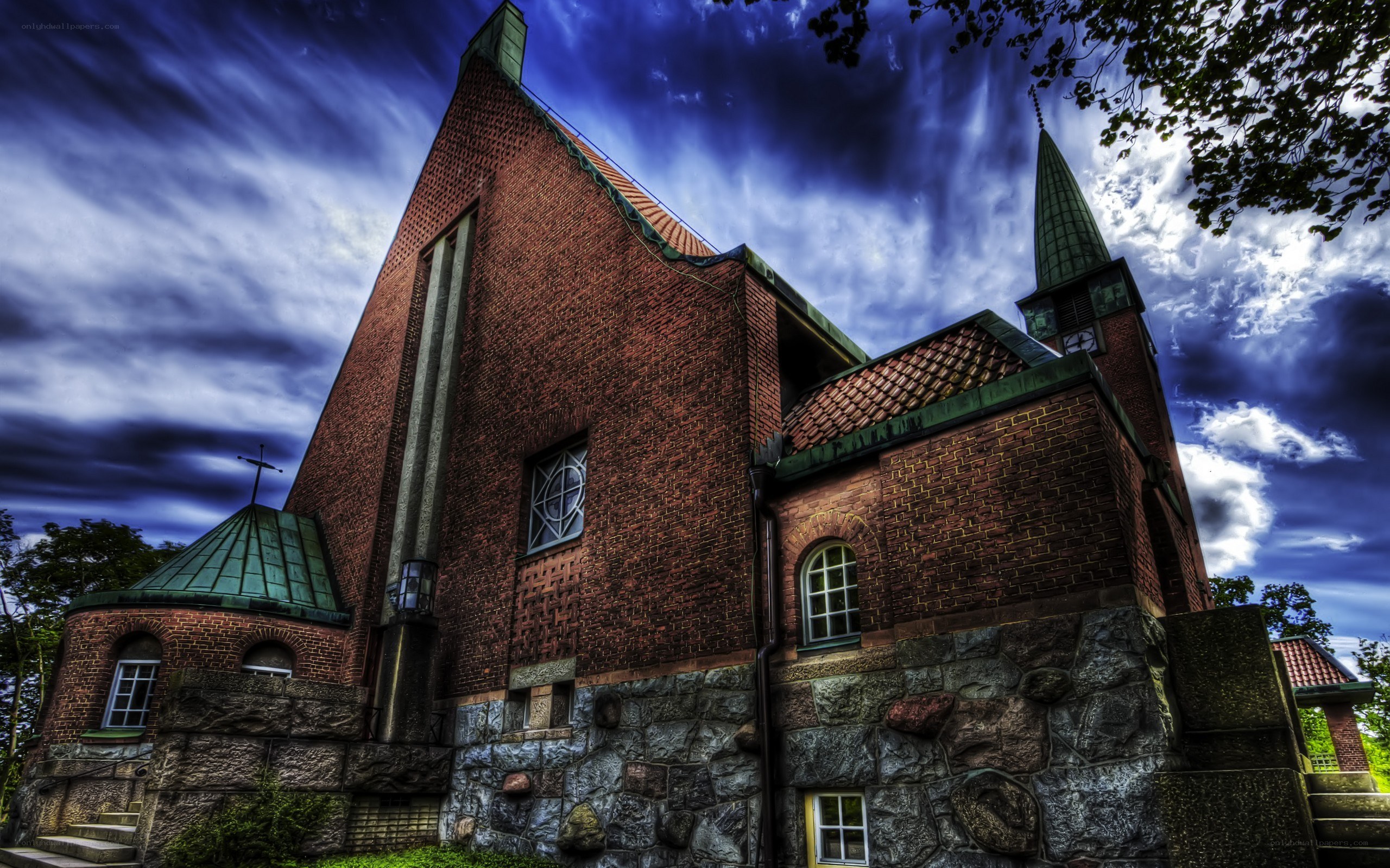 Brick church under dramatic sky
