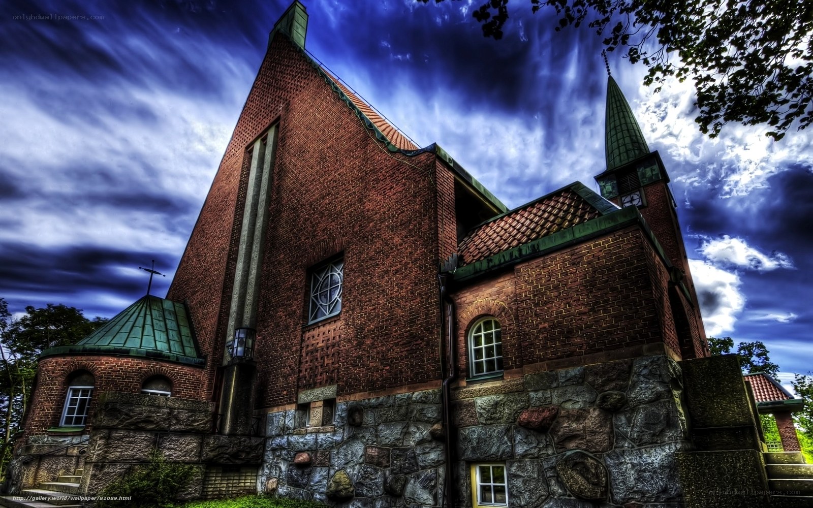 Brick church under dramatic sky