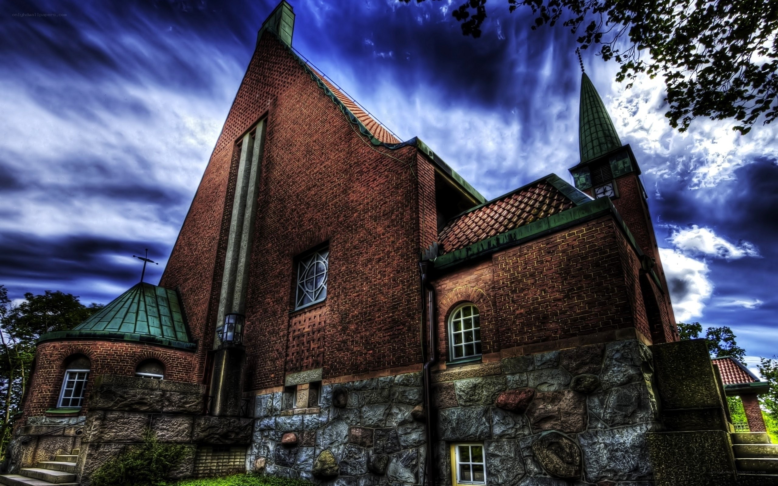 Brick church under stormy sky