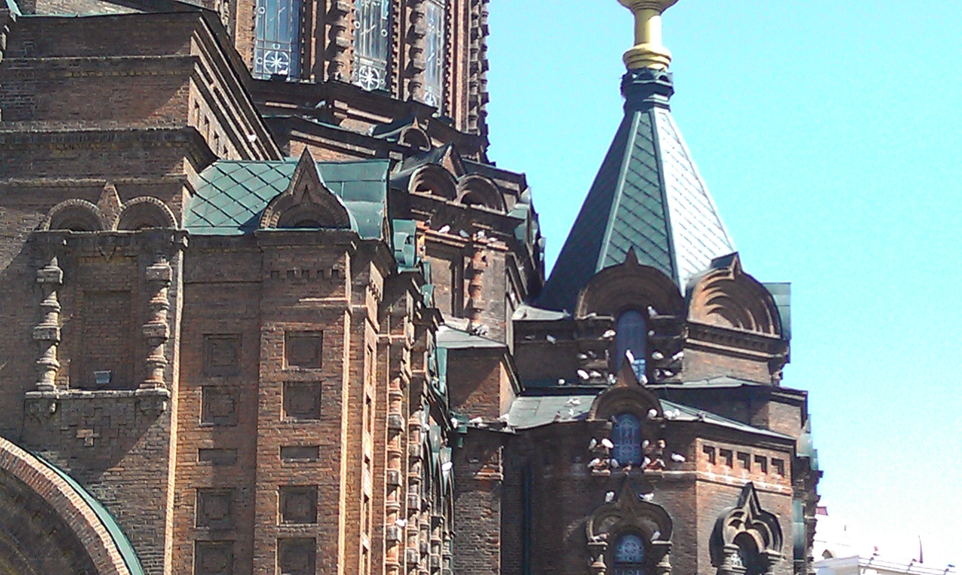 brick church with green domes