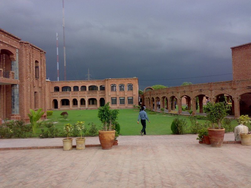 Brick courtyard under stormy sky