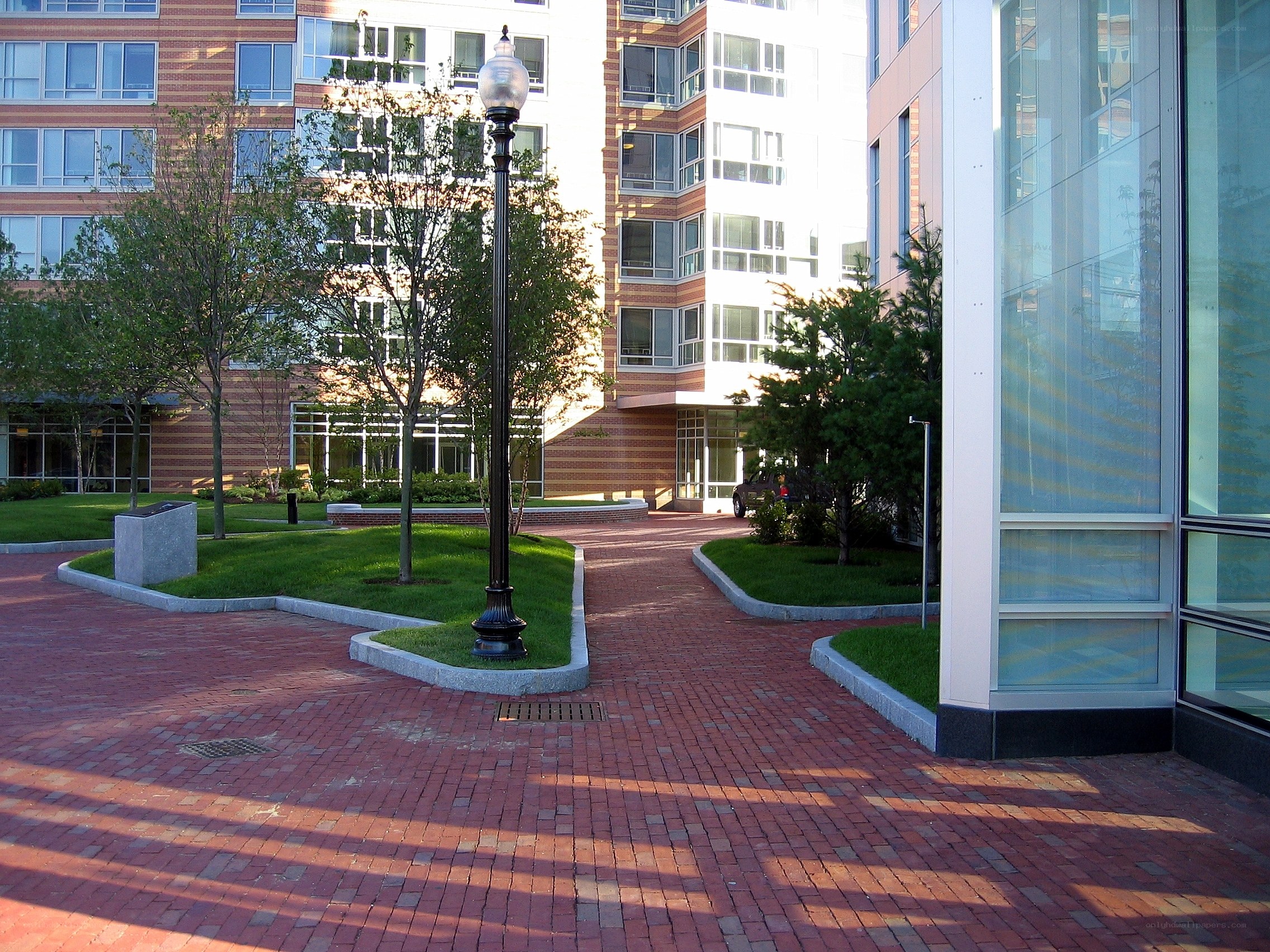 Brick courtyard with modern buildings