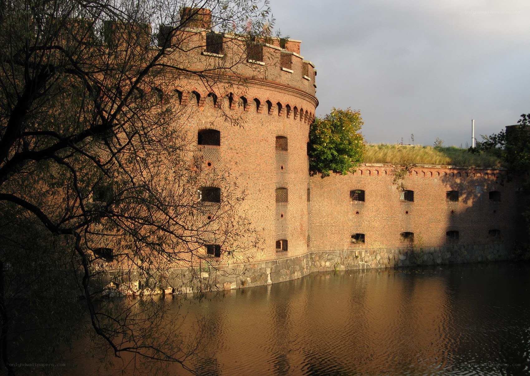 brick fortress by the water