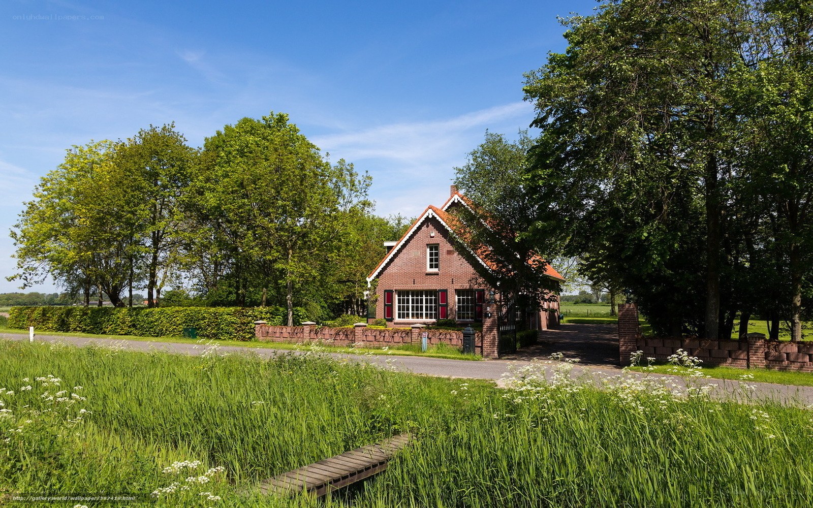 Brick house in rural landscape