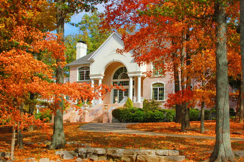 Brick House with Autumn Trees