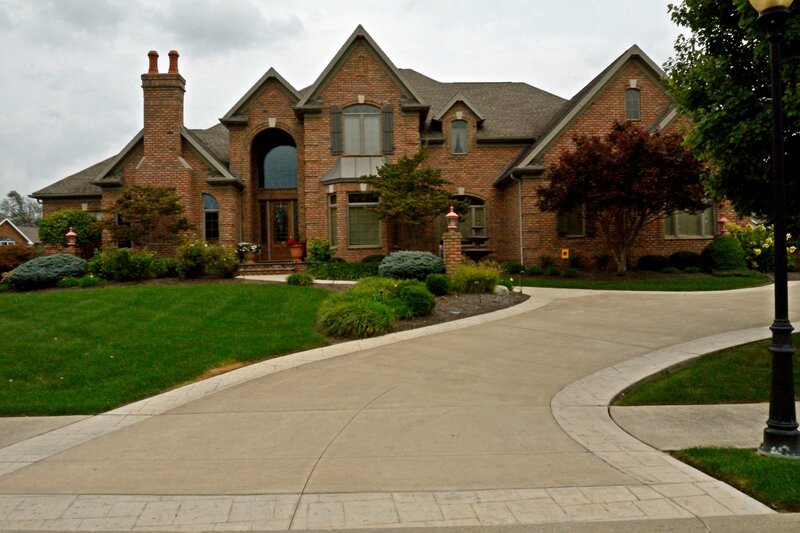 Brick House with Driveway — Brown