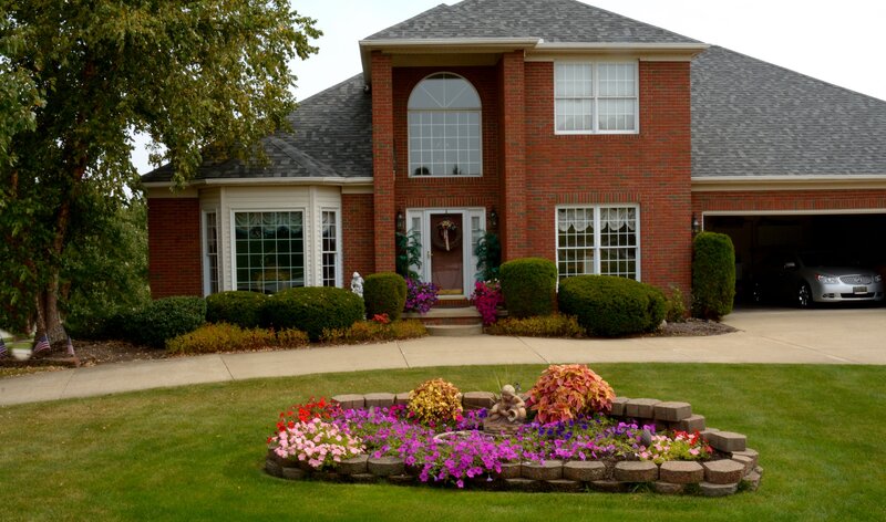 Brick House with Flower Bed