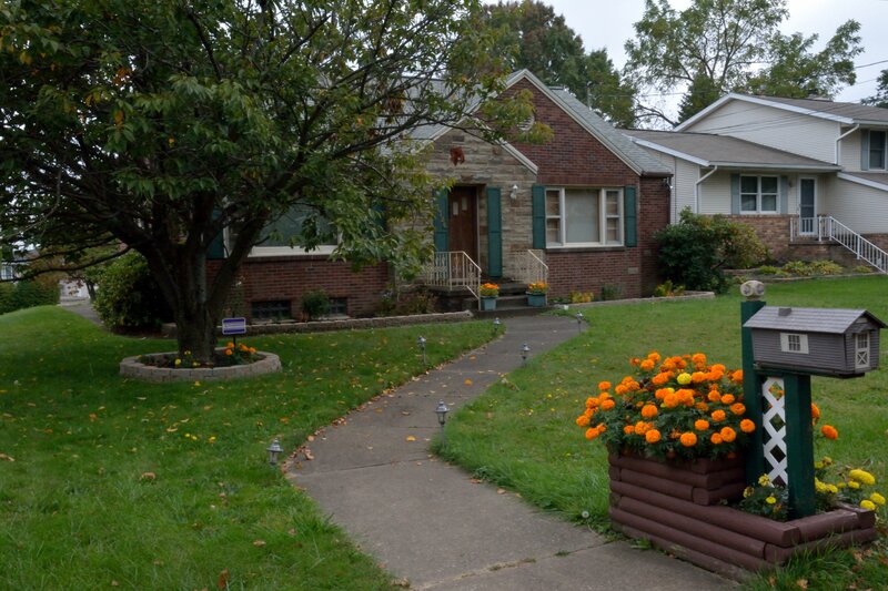 Brick House with Flowers