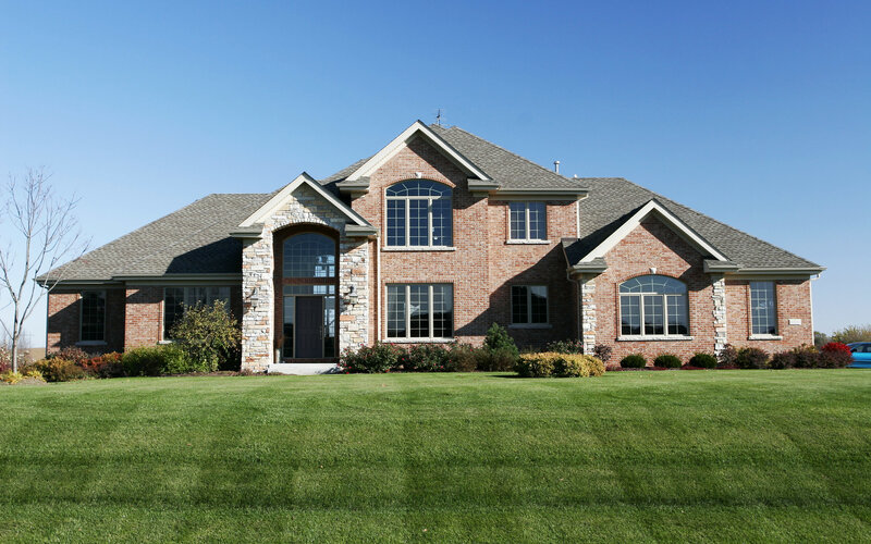 Brick house with green lawn