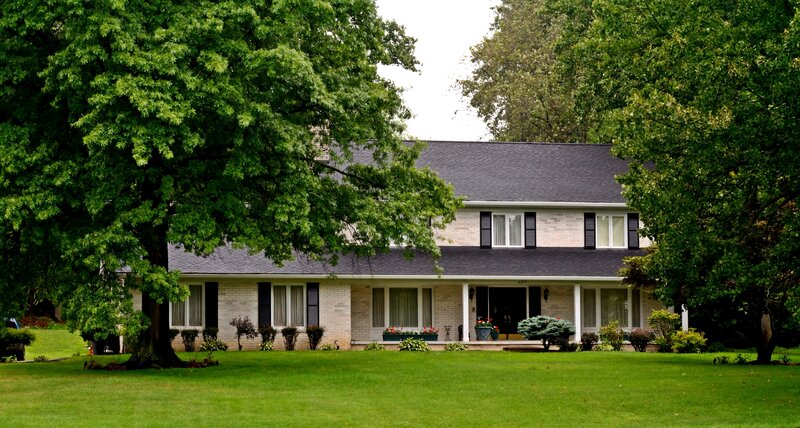 Brick House with Porch — Green, Serene, Afternoon, Photograph