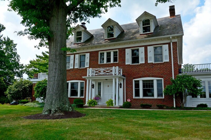 Brick House with Porch — Green, Serene
