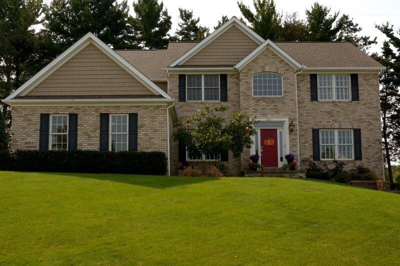 Brick House with Red Door