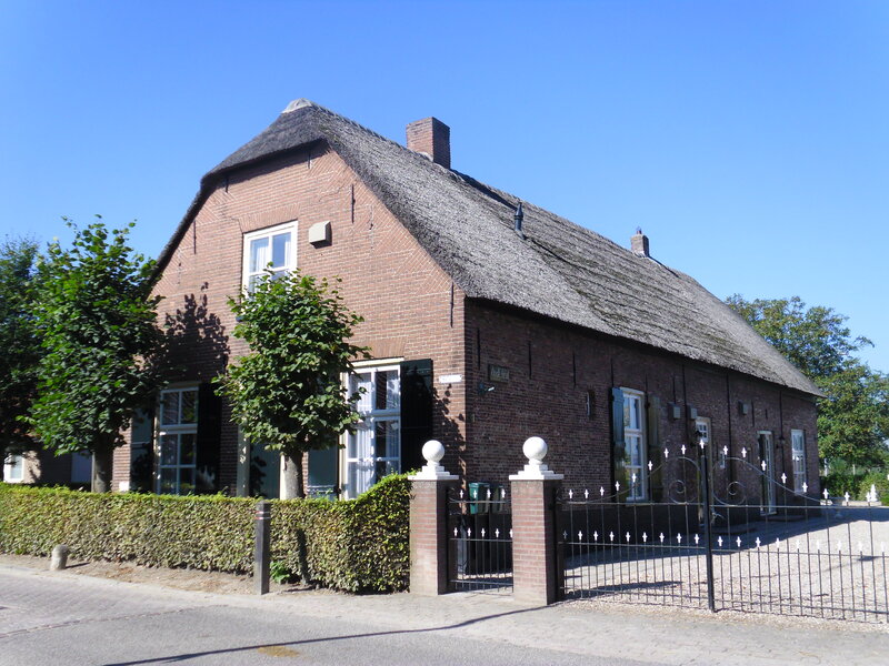Brick House with Thatched Roof